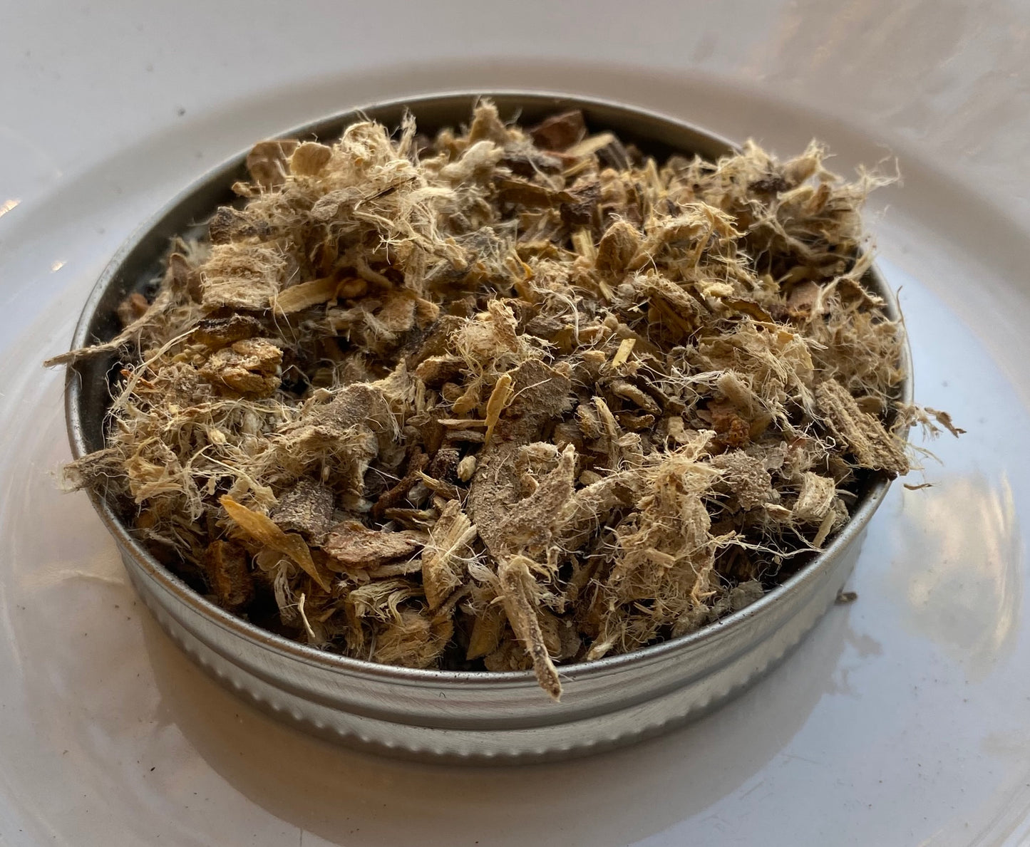 Winter Remedy tea blend with ginger, cinnamon, and natural ingredients for cold-season comfort.